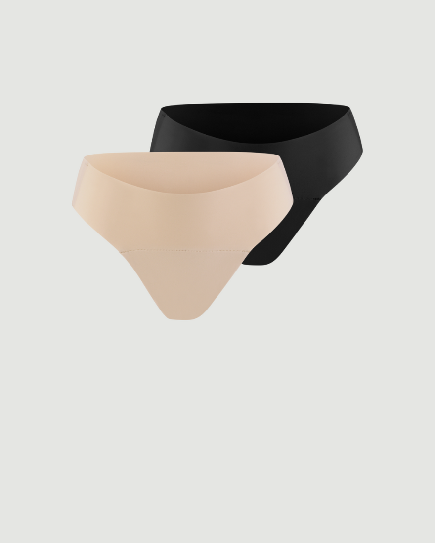 ooia everyday Slip Seamless in Schwarz und Beige – nahtlose Unterwäsche, die Slipeinlagen ersetzt.