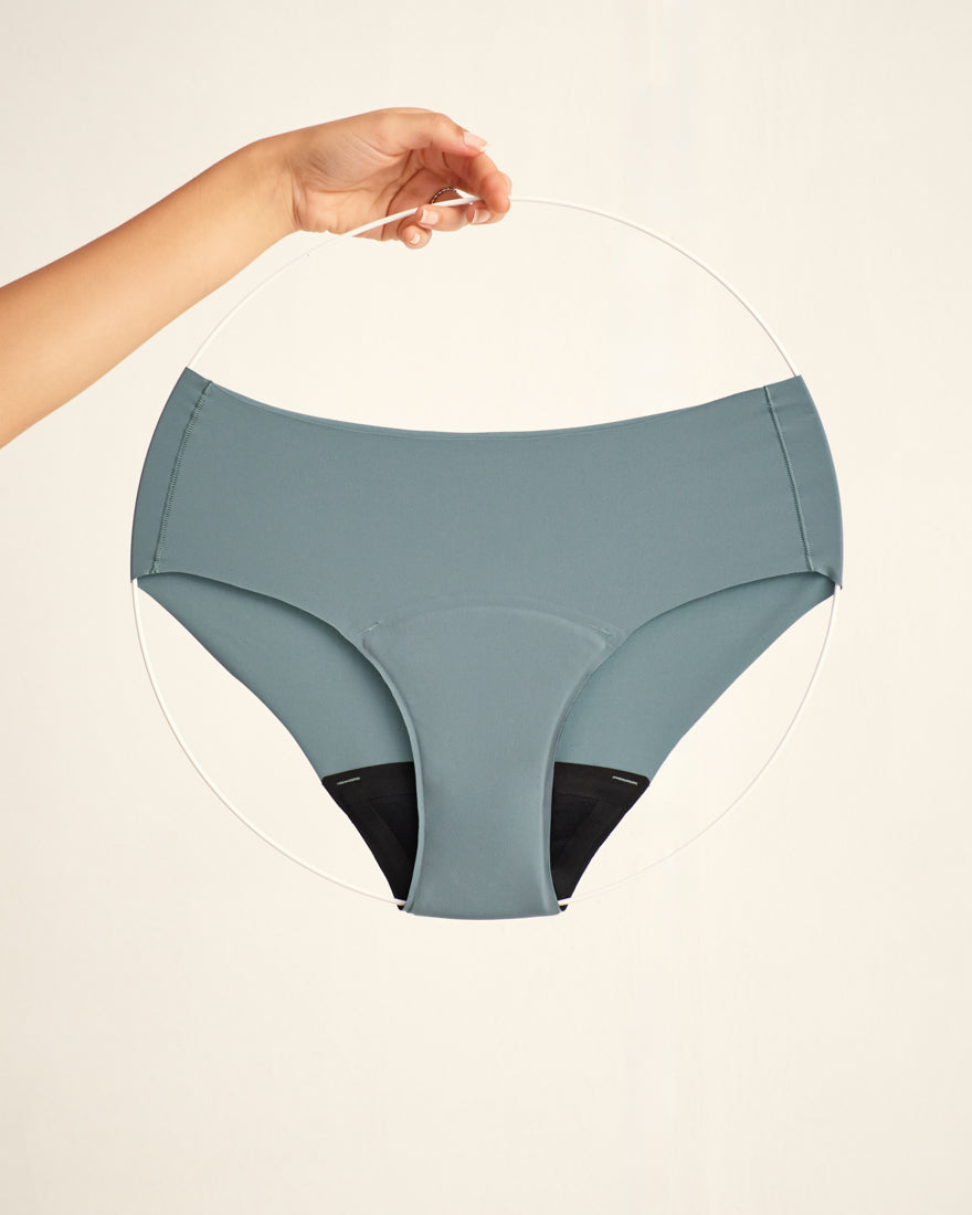 Periodenunterwäsche auf einem Ring, Hipster, Nahtloses Design in blau.