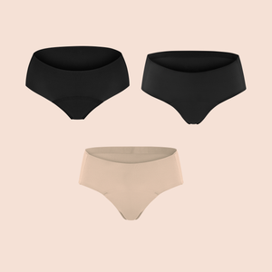 Periodenunterwäsche von ooia in Schwarz & Beige, auslaufsicheres Seamless Sport Set für einen hauchzarten & unsichtbaren Komfort während des Sports. Beinhaltet den Hipster Seamless schwarz, Hipster Seamless beige und den Hipster Seamless Extra Strong schwarz.
