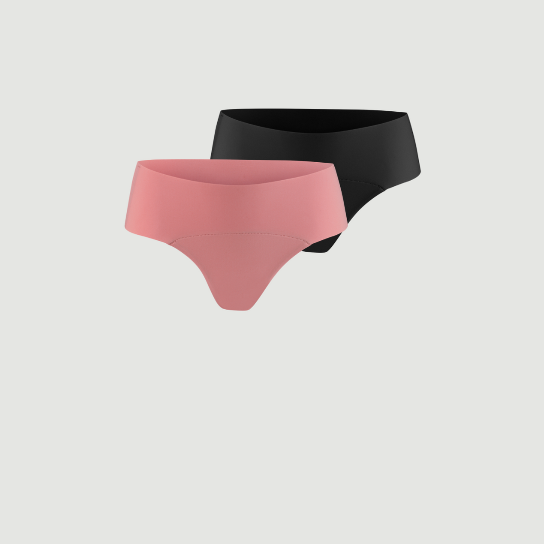 Modell trägt ooia everyday Hipster Seamless in Schwarz und Dusky Pink - Unterwäsche die Slipeinlagen ersetzt.