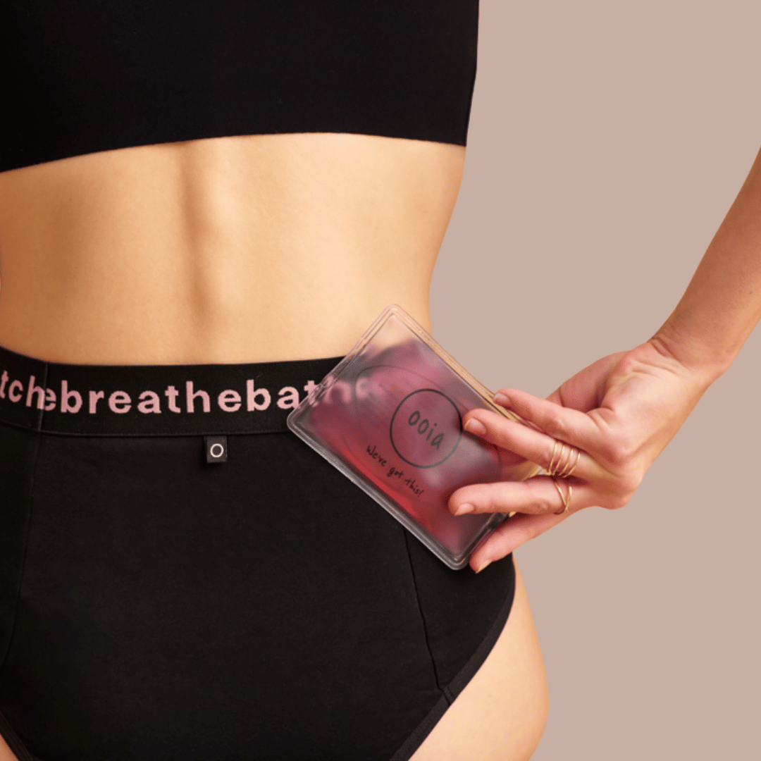 Bildausschnitt vom Periodenslip Hugs und einem Wärmepad