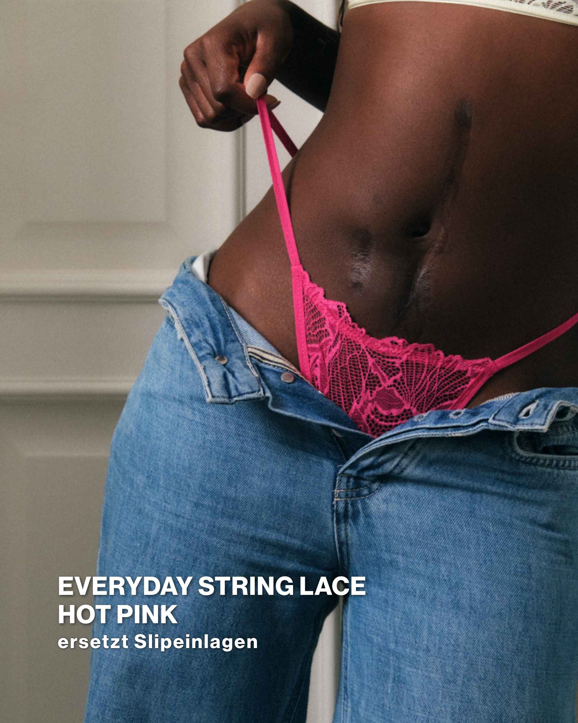Model präsentiert ooia Everyday String lace in hot pink. Im Everyday String Lace Set  enthalten. Detailaufnahme.